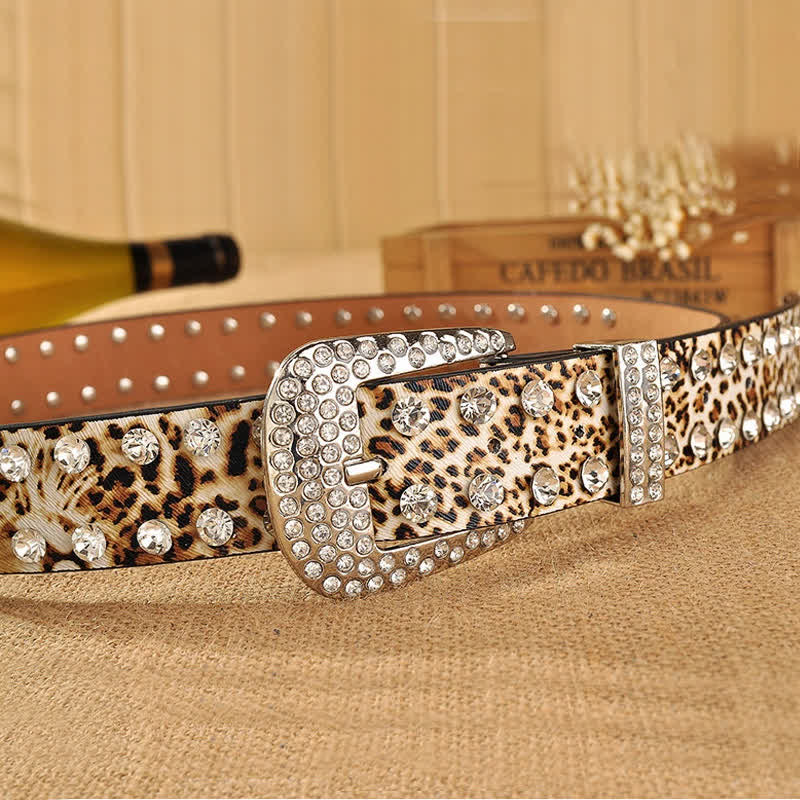 Cintura in pelle con stampa leopardata e strass intarsiati da donna