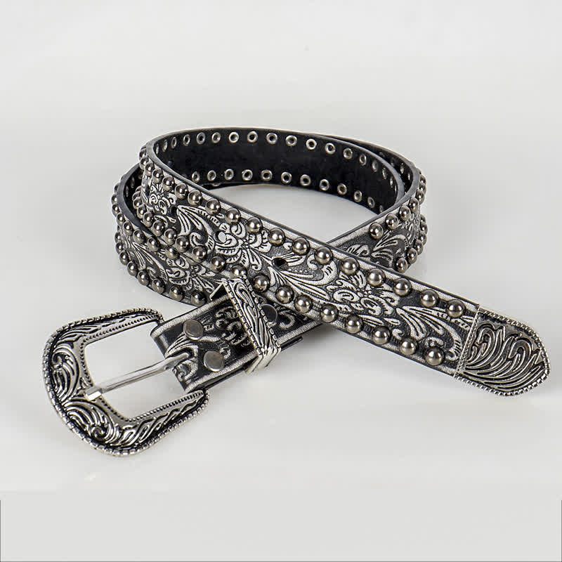 Cintura in pelle con borchie floreali incise punk da donna