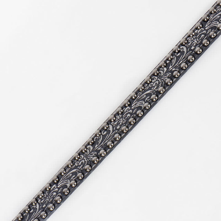 Cintura in pelle con borchie floreali incise punk da donna