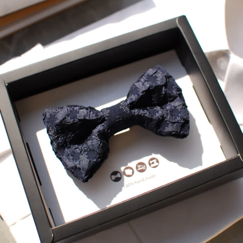 Papillon elegante da uomo in jacquard nero floreale