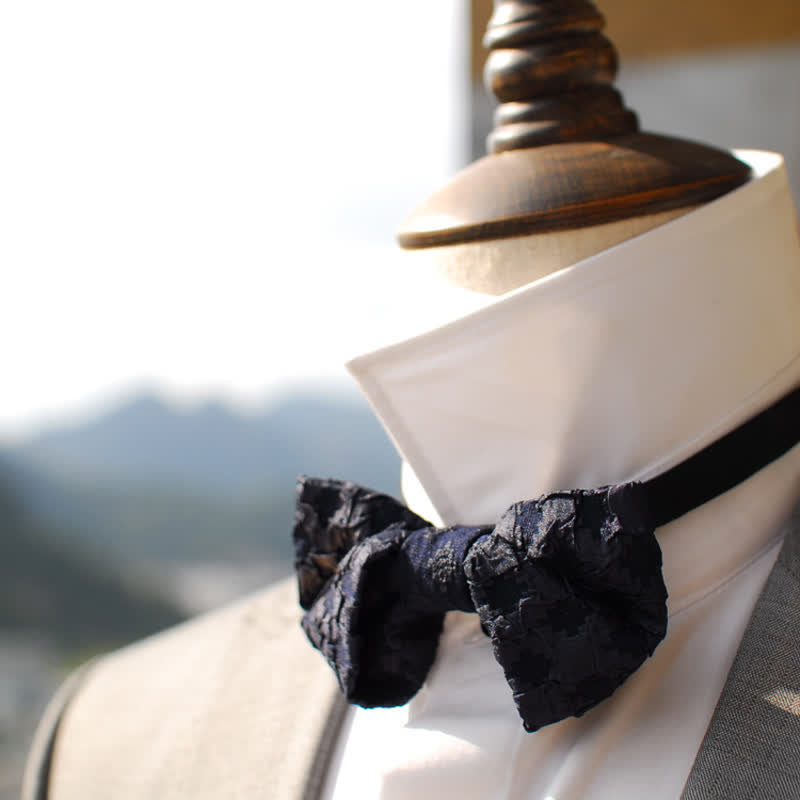 Papillon elegante da uomo in jacquard nero floreale
