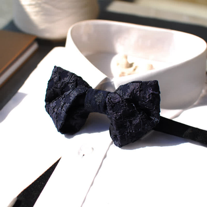 Papillon elegante da uomo in jacquard nero floreale