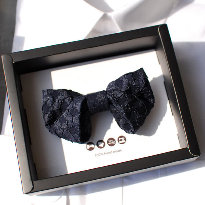 Papillon elegante da uomo in jacquard nero floreale