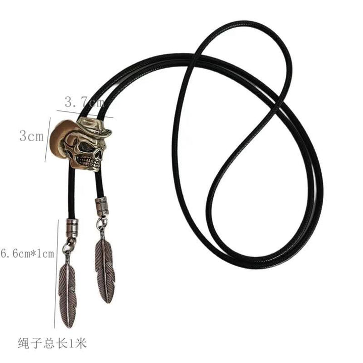 Cravatta Bolo con teschio in bronzo e cappello da cowboy