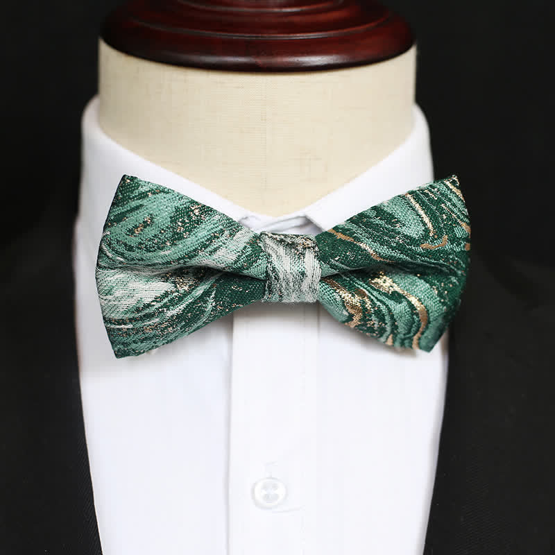 Papillon da uomo con accenti dorati e verde mare chiaro per matrimonio