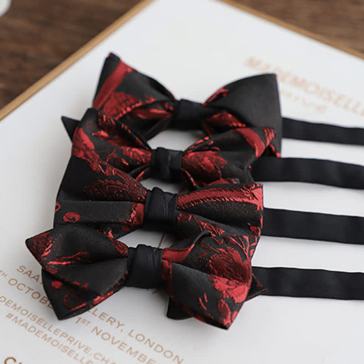 Papillon nero con motivo floreale rosso da uomo