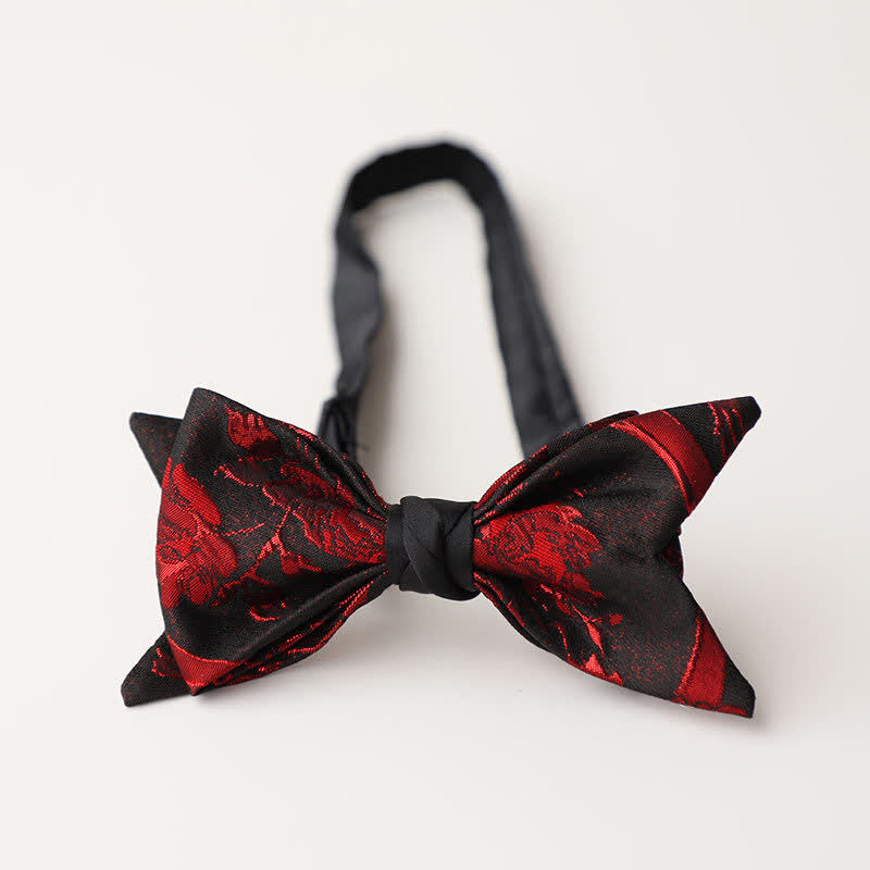 Papillon nero con motivo floreale rosso da uomo