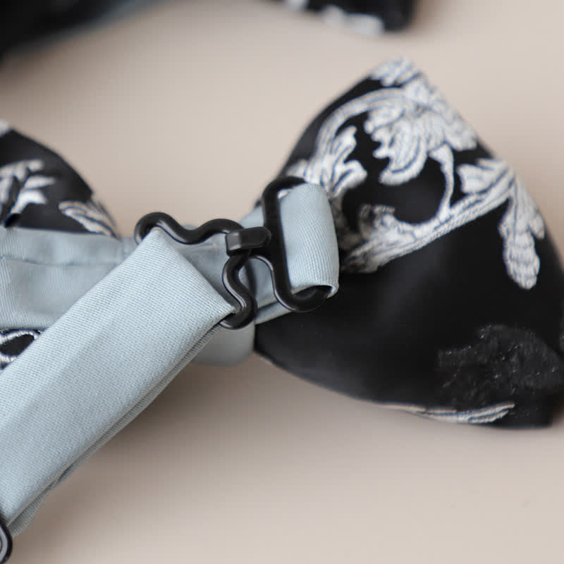 Papillon da uomo con ricamo floreale bianco e nero