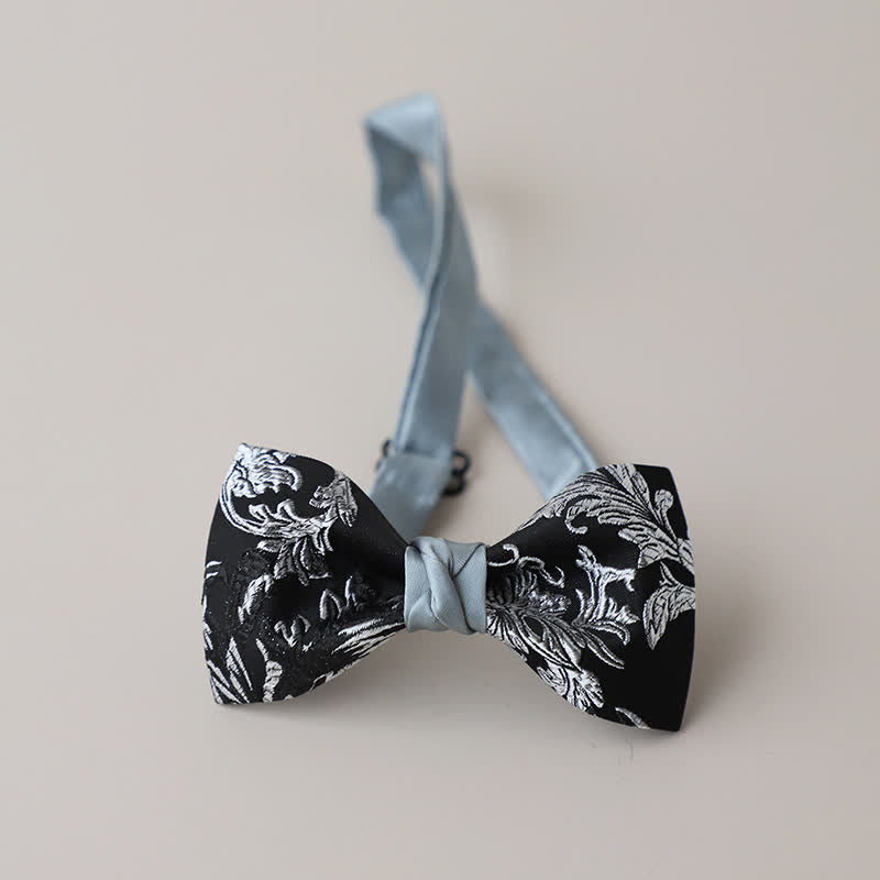 Papillon da uomo con ricamo floreale bianco e nero