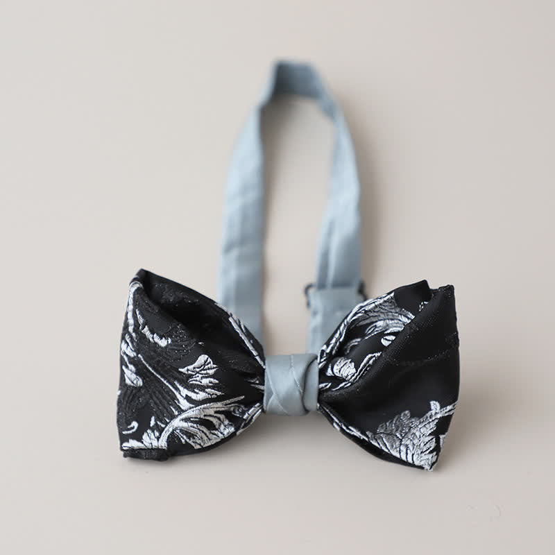 Papillon da uomo con ricamo floreale bianco e nero
