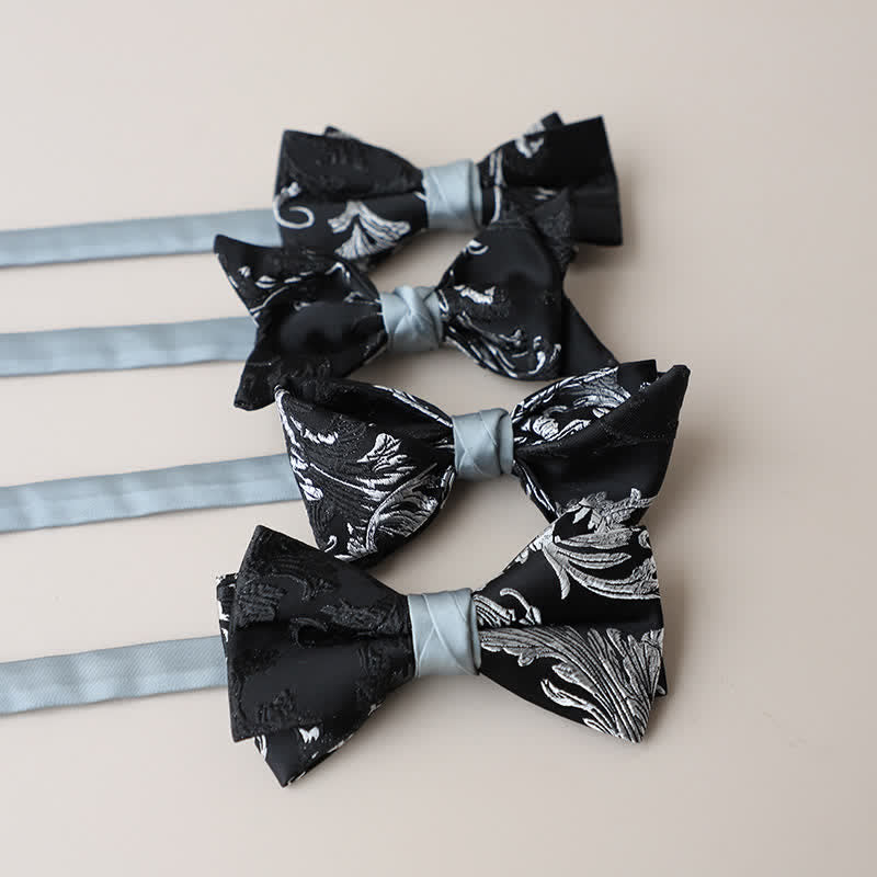 Papillon da uomo con ricamo floreale bianco e nero