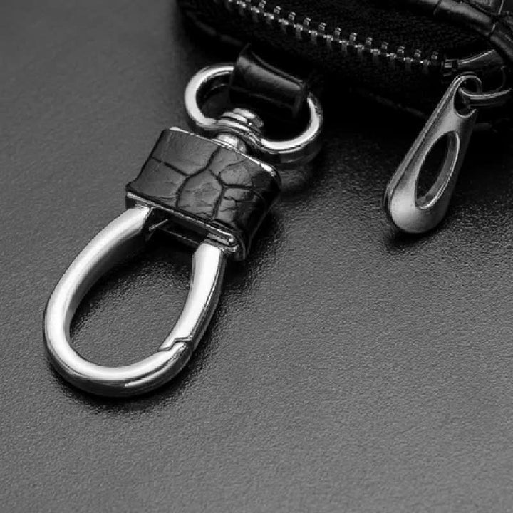 Custodia per chiavi in pelle con cerniera e motivo alligatore