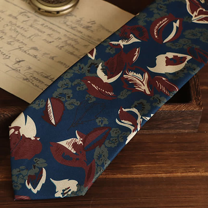 Cravatta da uomo con motivo floreale blu navy e rosso