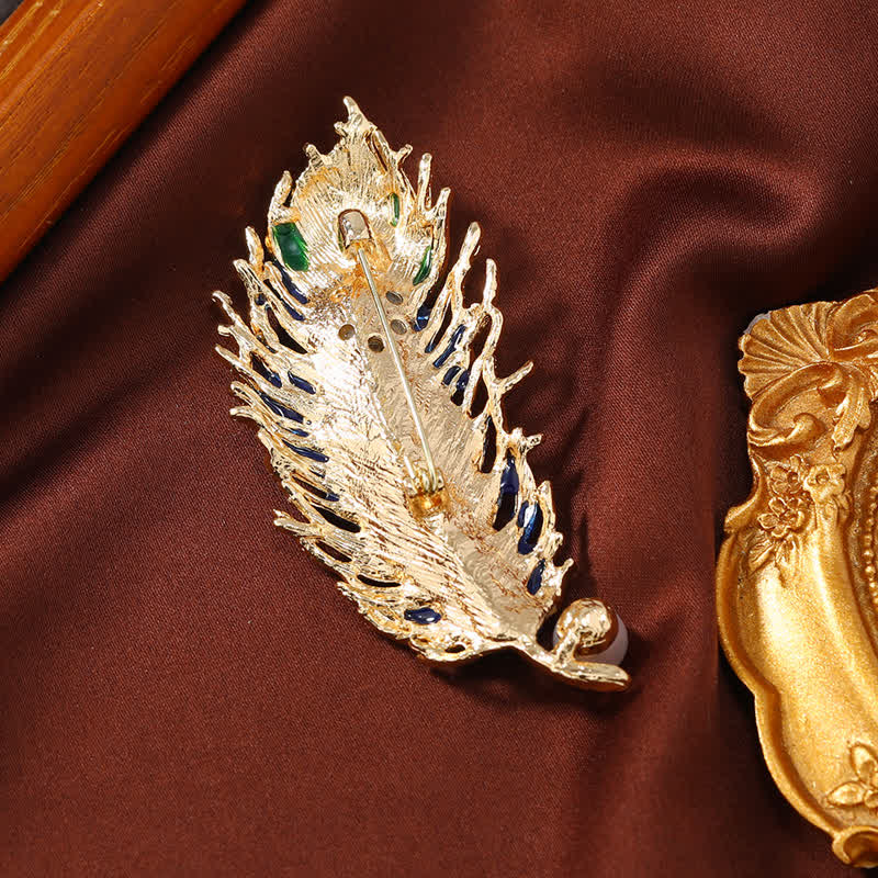 Spilla da donna in smalto con piuma di fenice e cristallo