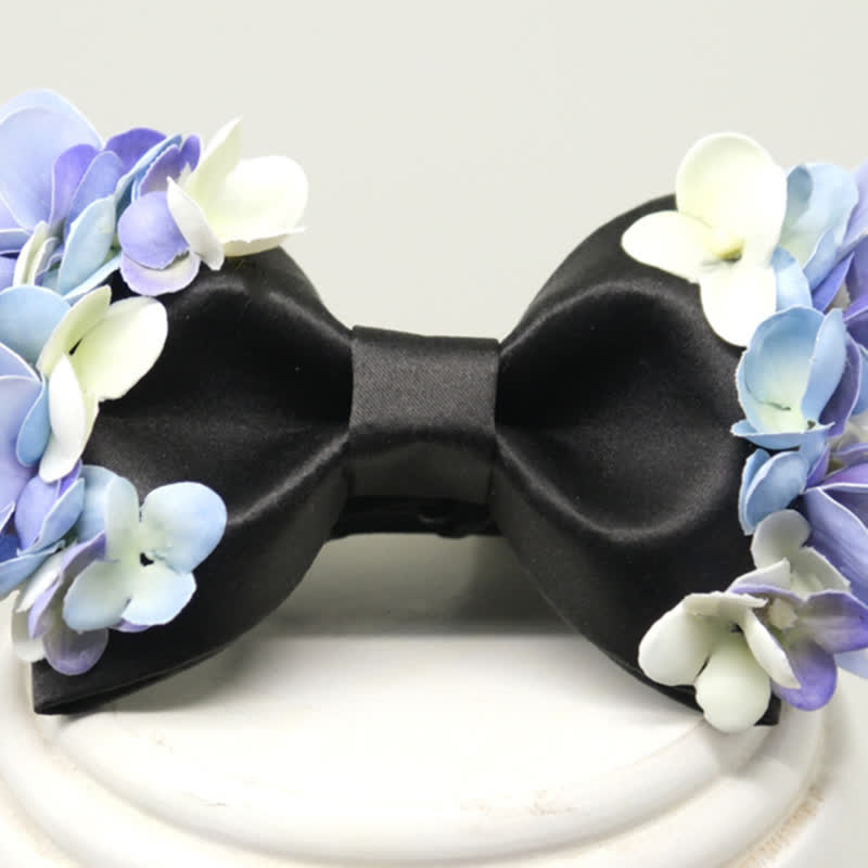 Papillon da uomo con fiori artificiali viola e bianchi da giardino
