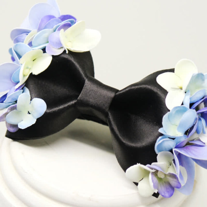 Papillon da uomo con fiori artificiali viola e bianchi da giardino