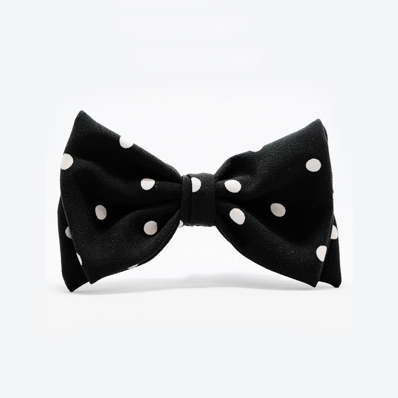Papillon da uomo a pois bianchi e neri