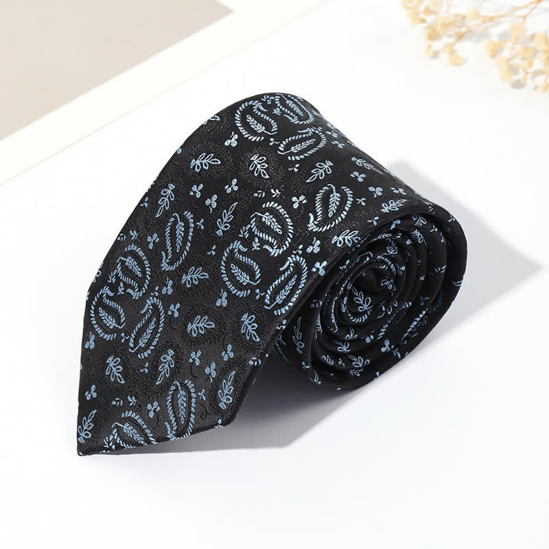 Cravatta da uomo in jacquard con sfondo nero e motivo anacardi