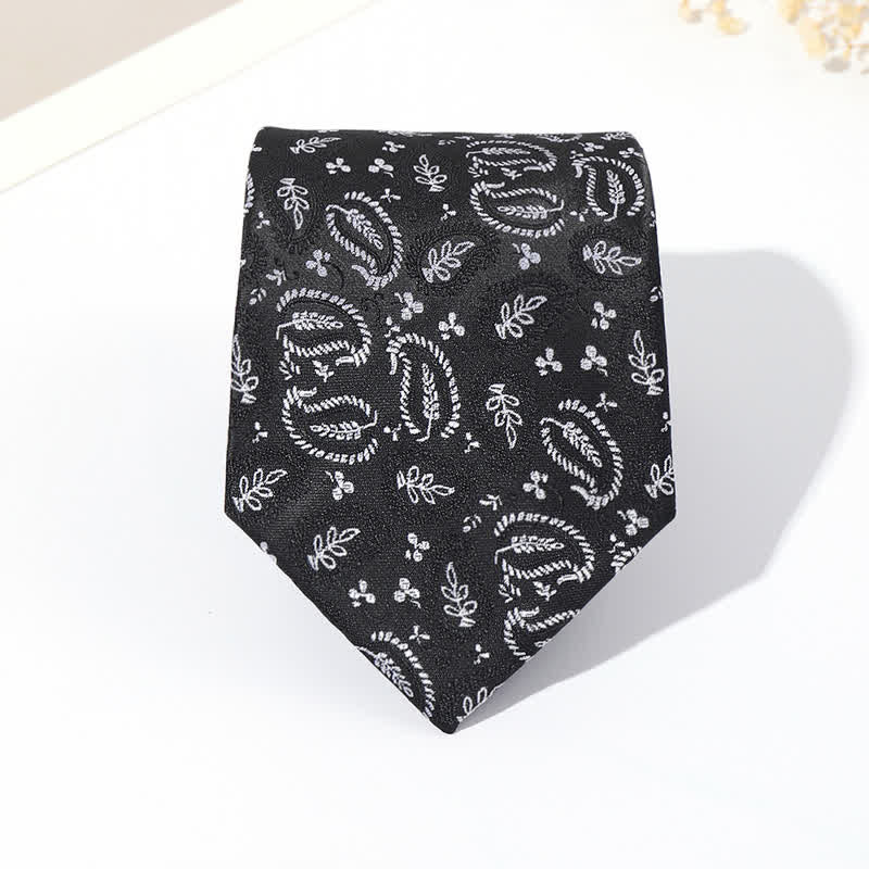 Cravatta da uomo in jacquard con sfondo nero e motivo anacardi