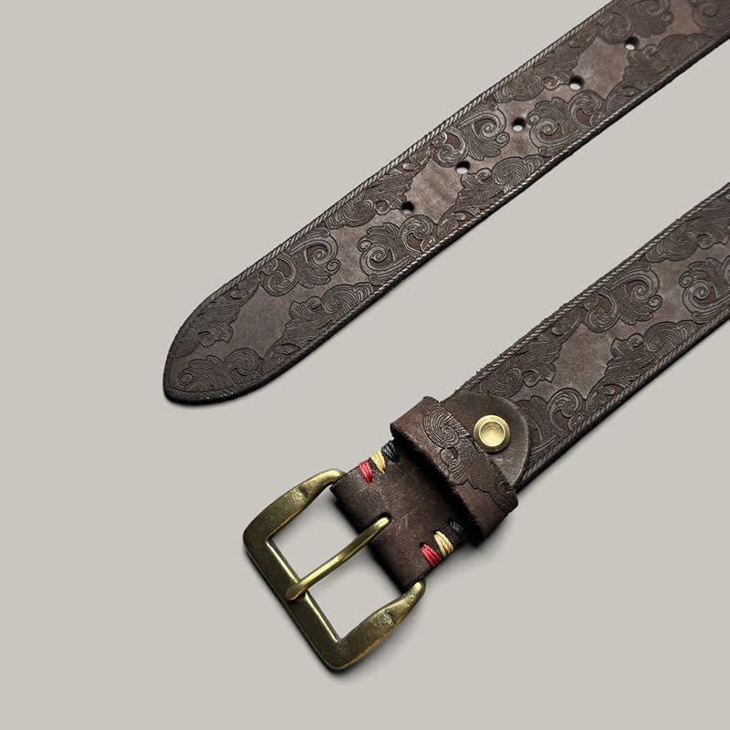 Cintura in pelle goffrata con motivo floreale vintage delicato