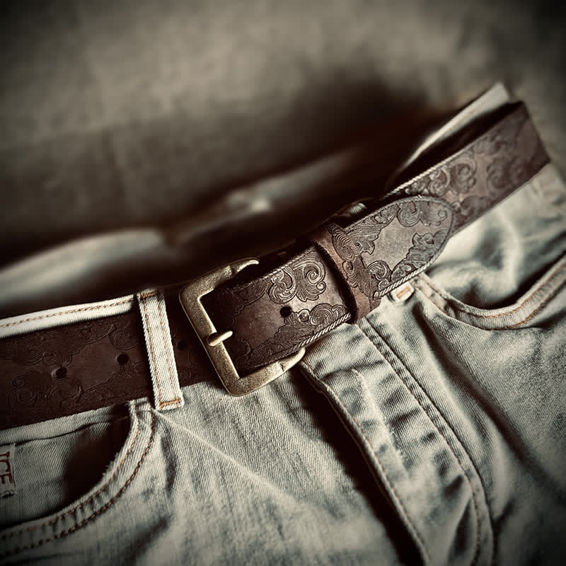 Cintura in pelle goffrata con motivo floreale vintage delicato