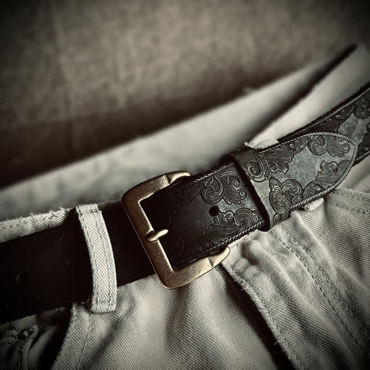 Cintura in pelle goffrata con motivo floreale vintage delicato