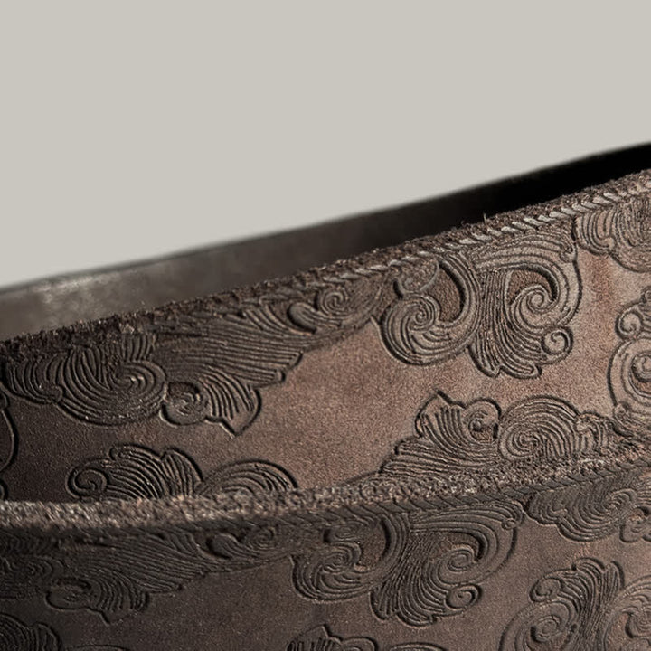 Cintura in pelle goffrata con motivo floreale vintage delicato