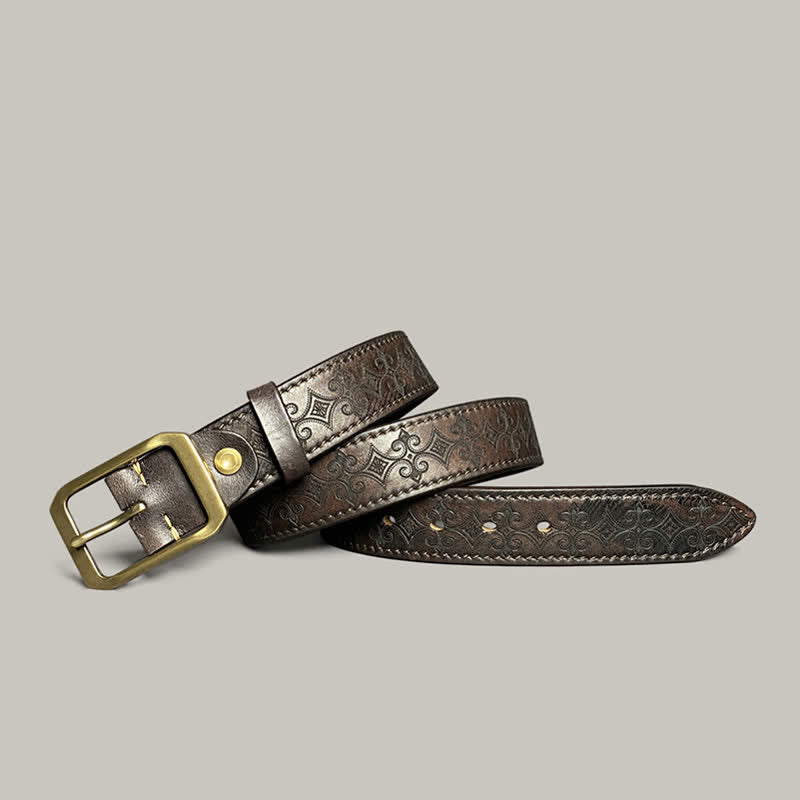 Cintura in pelle con fibbia in ottone e cinturino con incisione stampata