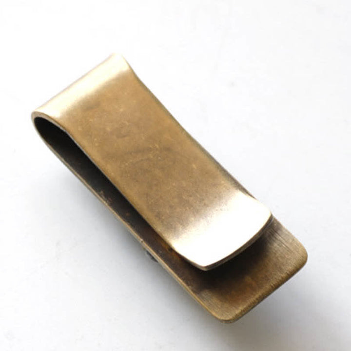 Fermasoldi portatile creativo in ottone a forma di teschio di uccello