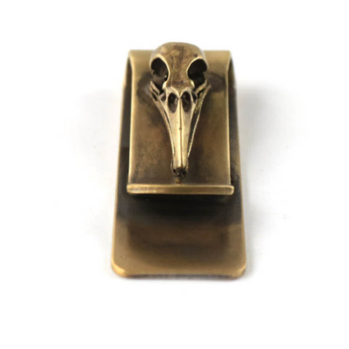 Fermasoldi portatile creativo in ottone a forma di teschio di uccello - image 1