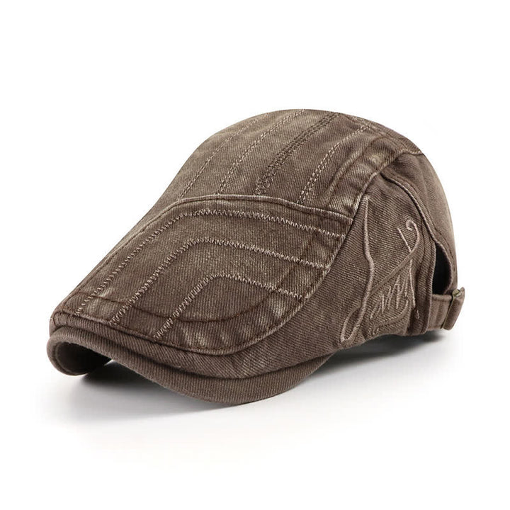 Cappello basco piatto con ricamo anticato a becco d'anatra