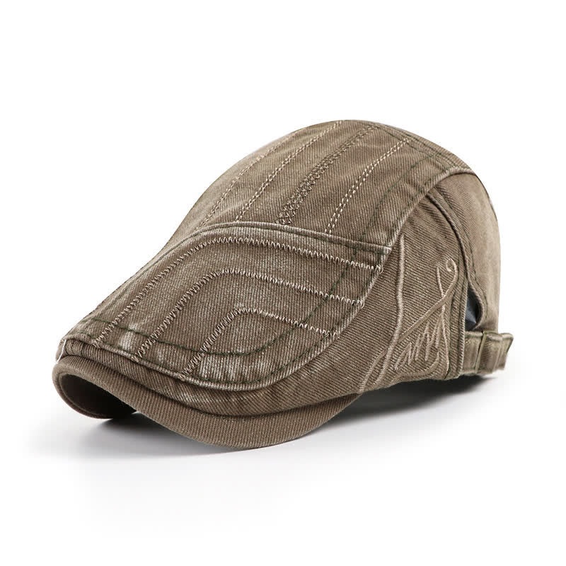 Cappello basco piatto con ricamo anticato a becco d'anatra