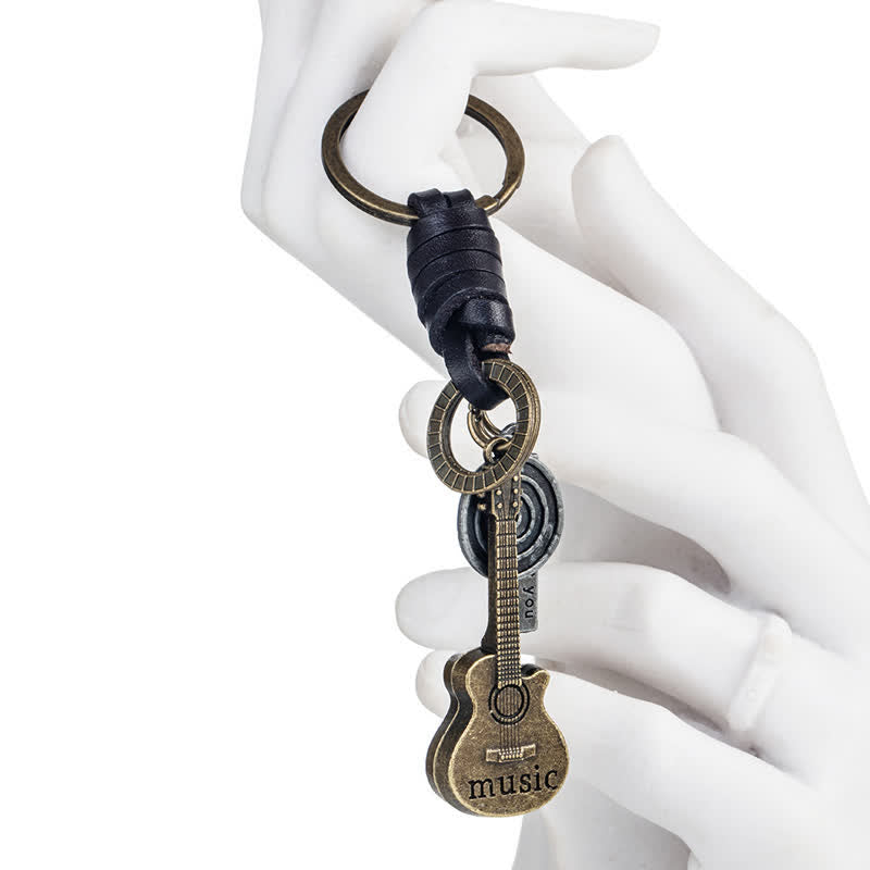 Portachiavi in pelle con ciondolo a forma di chitarra musicale - image 4