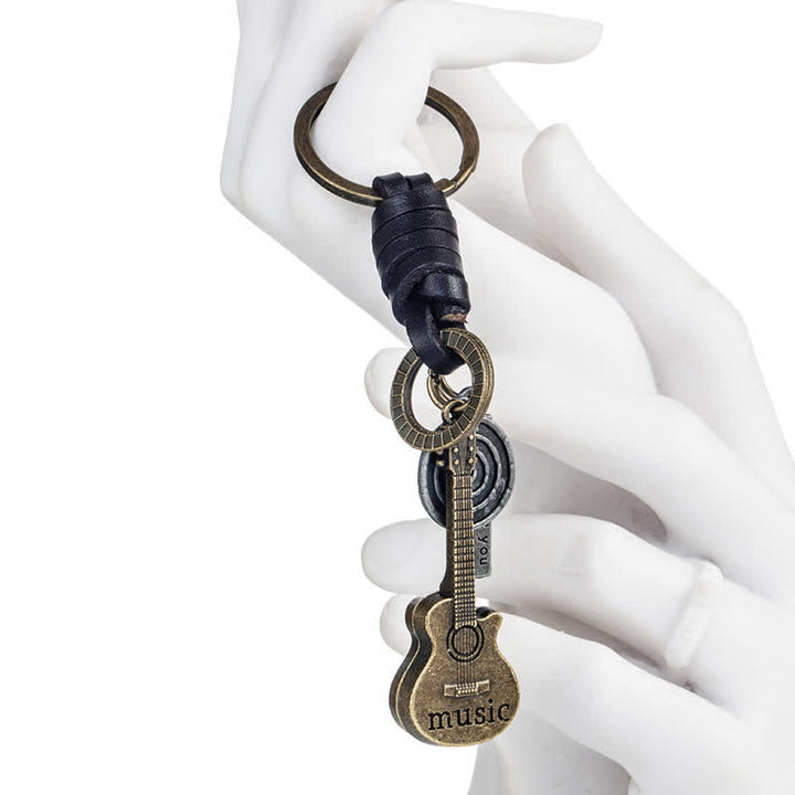Portachiavi in pelle con ciondolo a forma di chitarra musicale - image 4