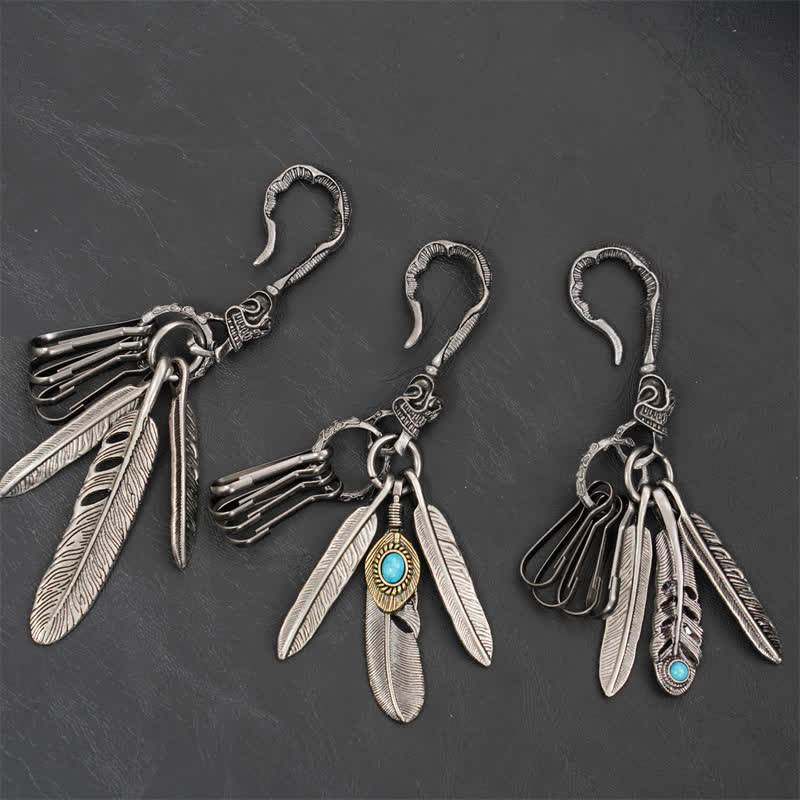 Portachiavi in pelle turchese blu con piume di teschio boho