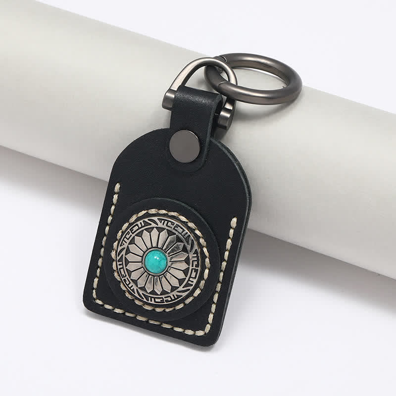 Portachiavi in pelle turchese con grazioso fiore boho
