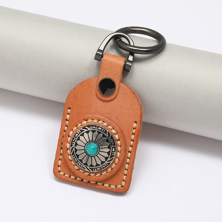 Portachiavi in pelle turchese con grazioso fiore boho