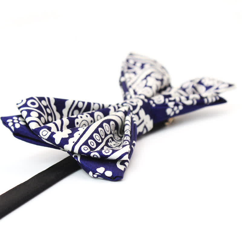 Papillon da uomo con stampa a pois bianchi e blu navy anacardi
