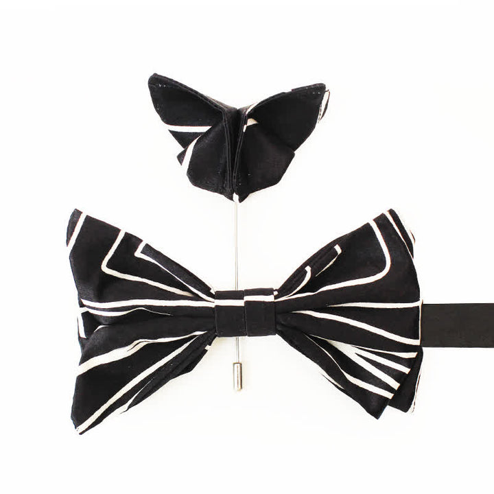 Papillon da uomo con linee geometriche bianche e nere