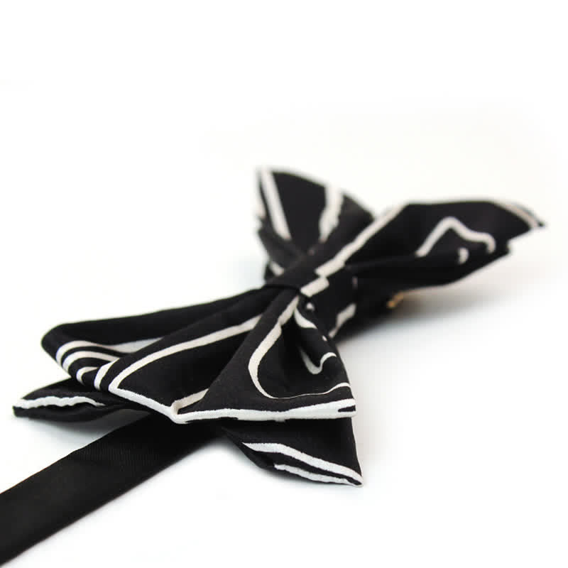 Papillon da uomo con linee geometriche bianche e nere