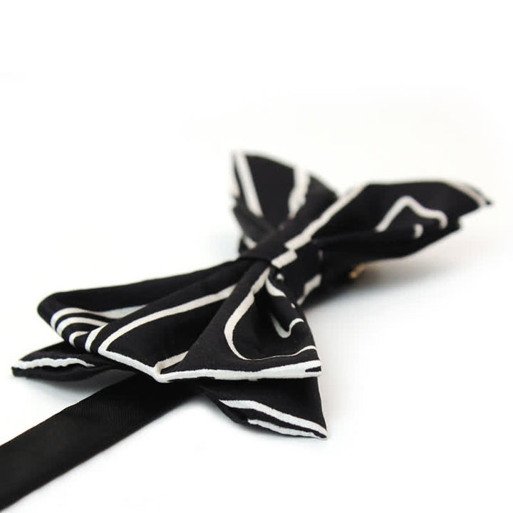 Papillon da uomo con linee geometriche bianche e nere