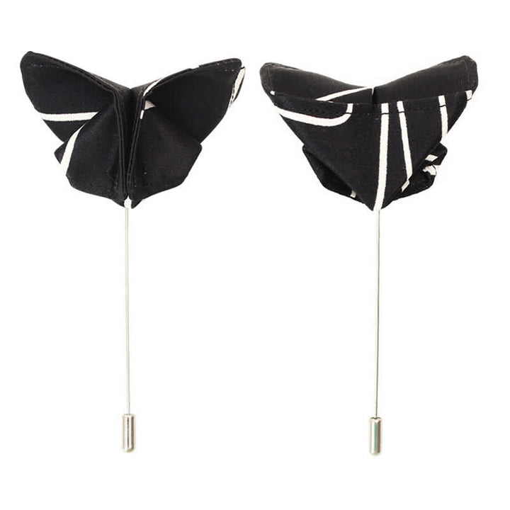 Papillon da uomo con linee geometriche bianche e nere