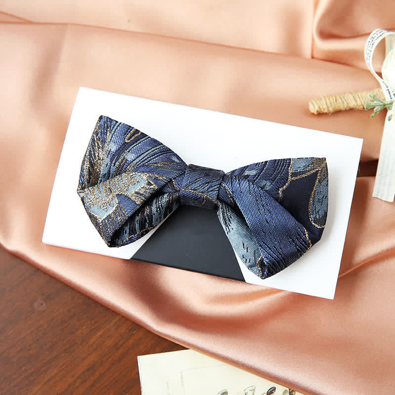 Papillon da uomo in jacquard floreale blu e oro brillante