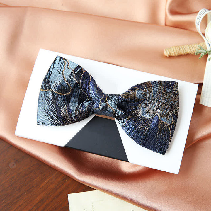 Papillon da uomo in jacquard floreale blu e oro brillante