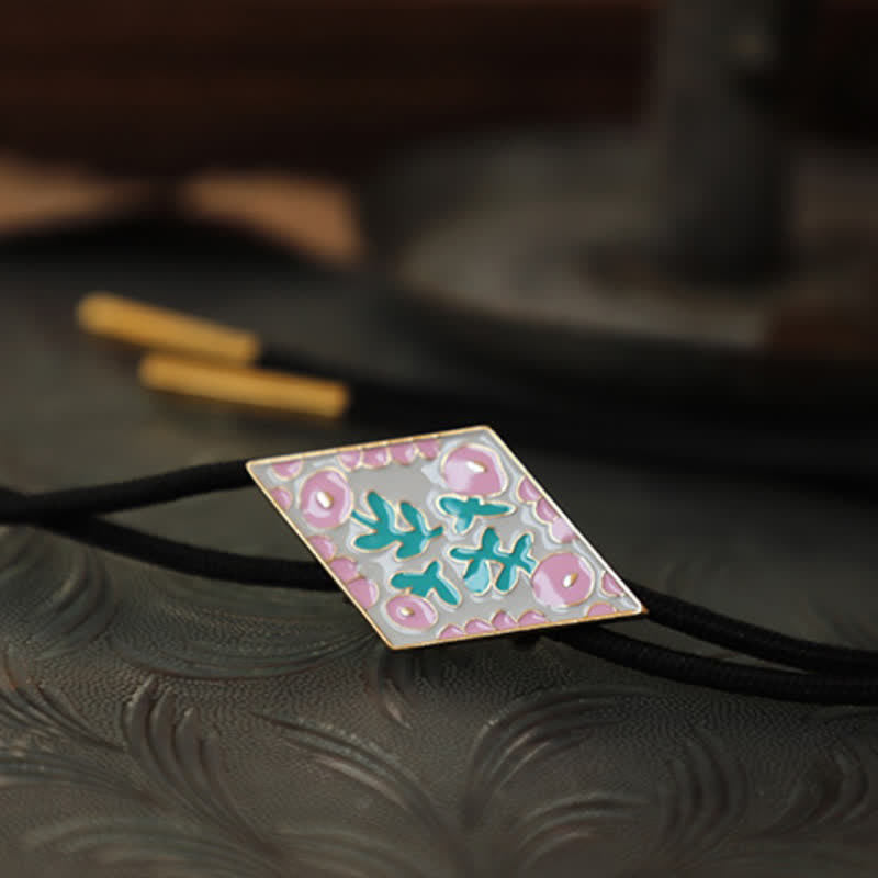 Cravatta Bolo con piccolo fiore colorato e rombo retrò