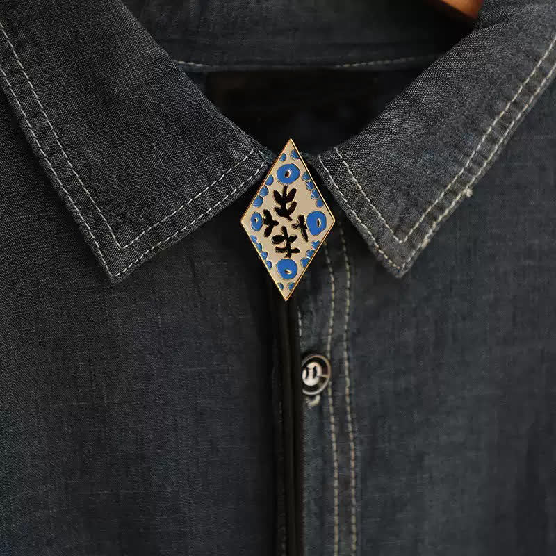 Cravatta Bolo con piccolo fiore colorato e rombo retrò