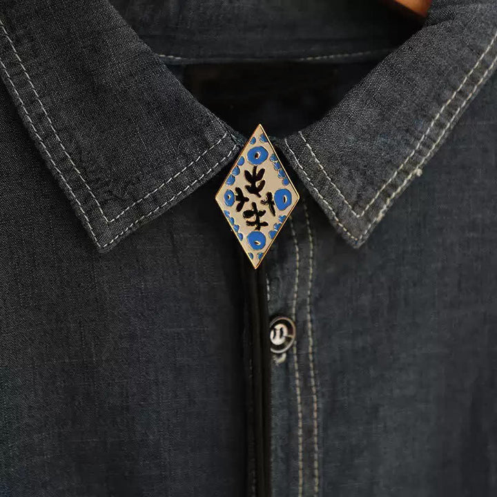 Cravatta Bolo con piccolo fiore colorato e rombo retrò