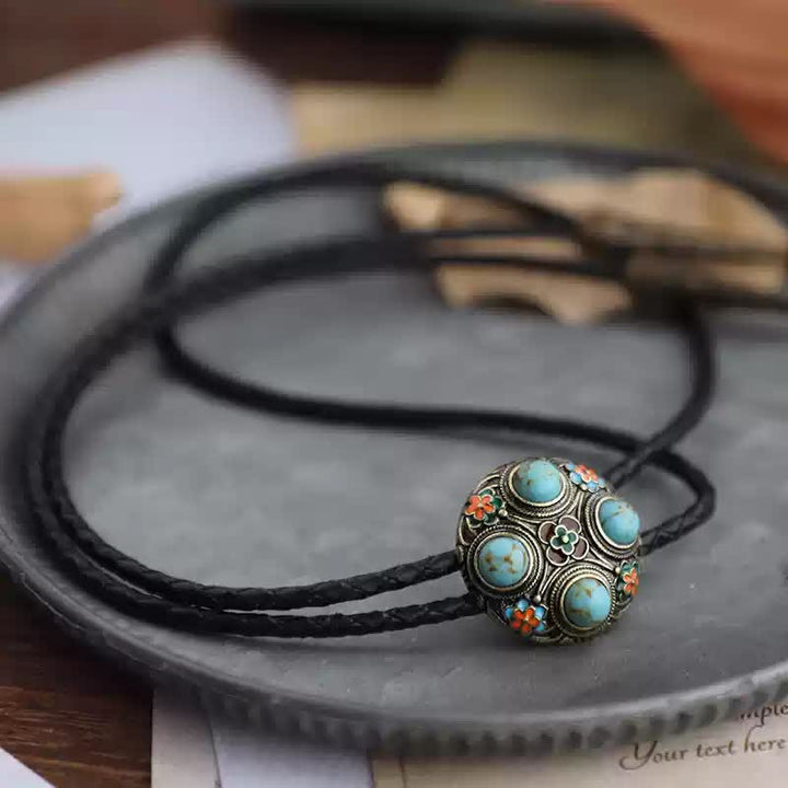 Cravatta Bolo con fiore in smalto turchese blu antico