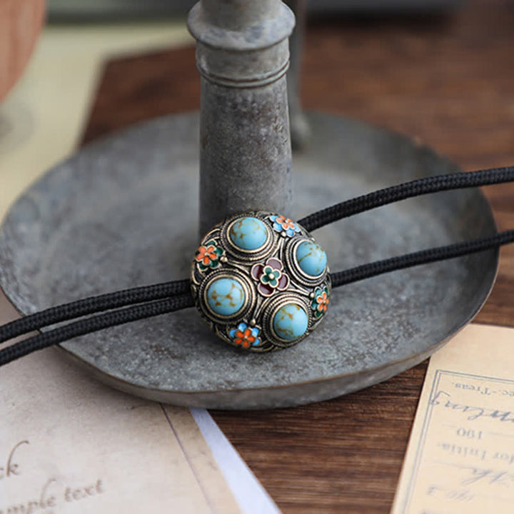 Cravatta Bolo con fiore in smalto turchese blu antico