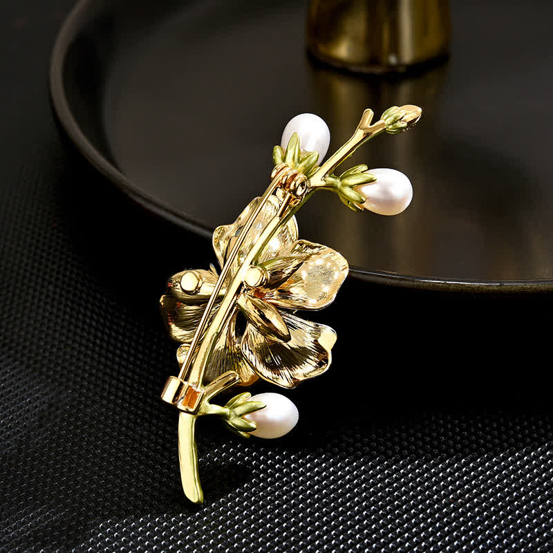 Spilla da donna con fiore di magnolia in smalto blu e perle finte